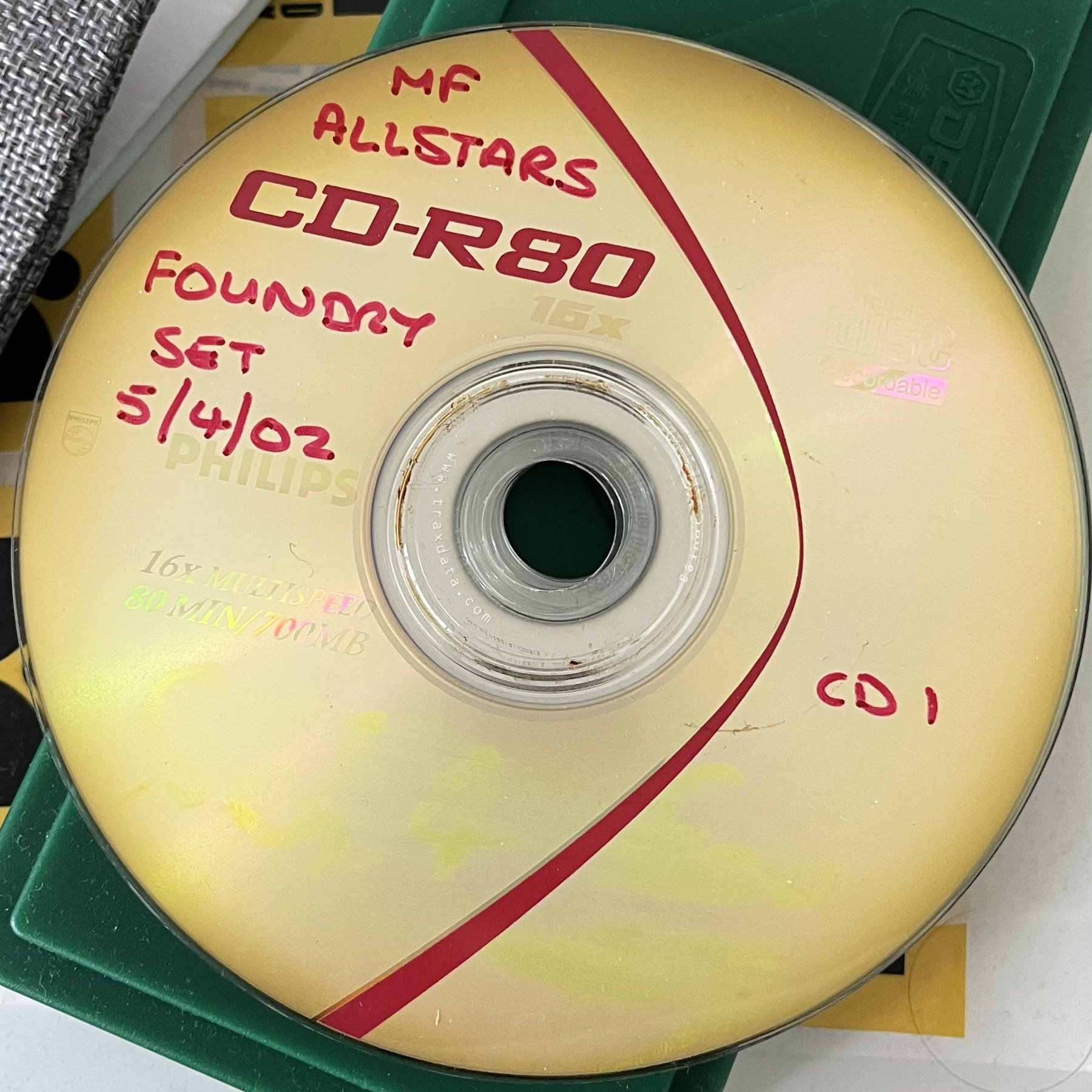 EXHIBIT A: CD-R of the first ever MFA live performance. The Foundry, 05.04.2002.